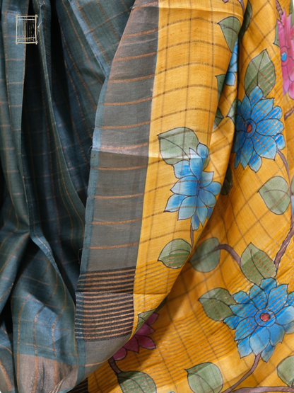 Pleats and pallu shot — mustard kalamkari with pink lotus over teal tussar pleats