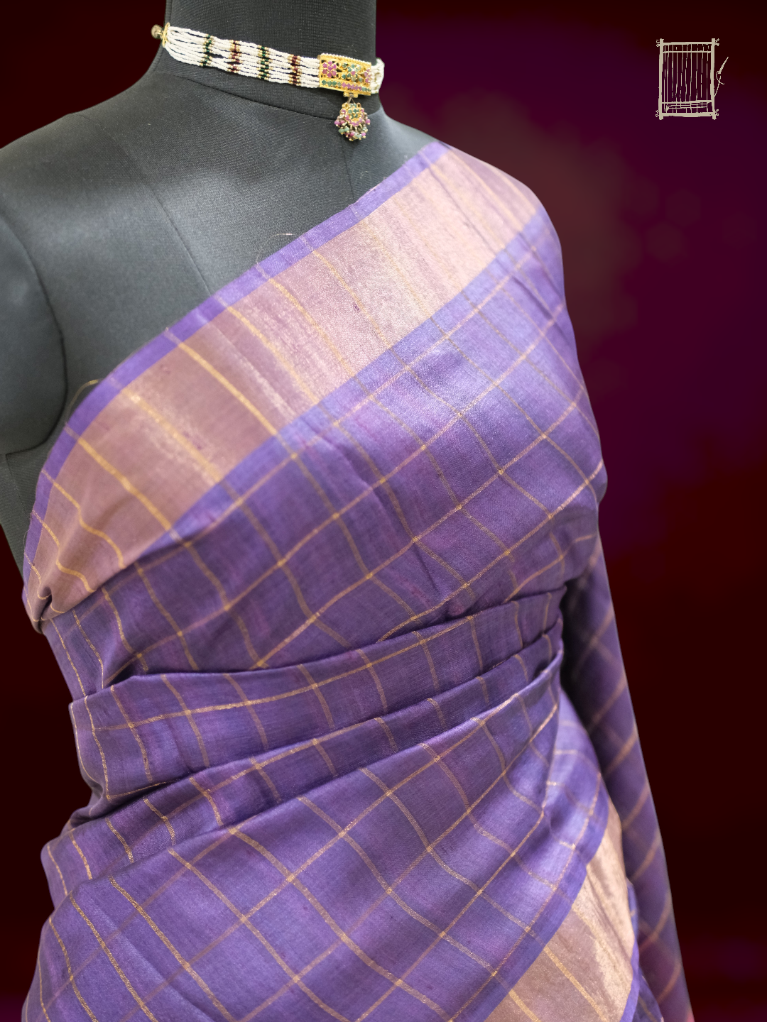 Top bust drape of dusty violet tussar saree with fine gold-zari checks and navy border