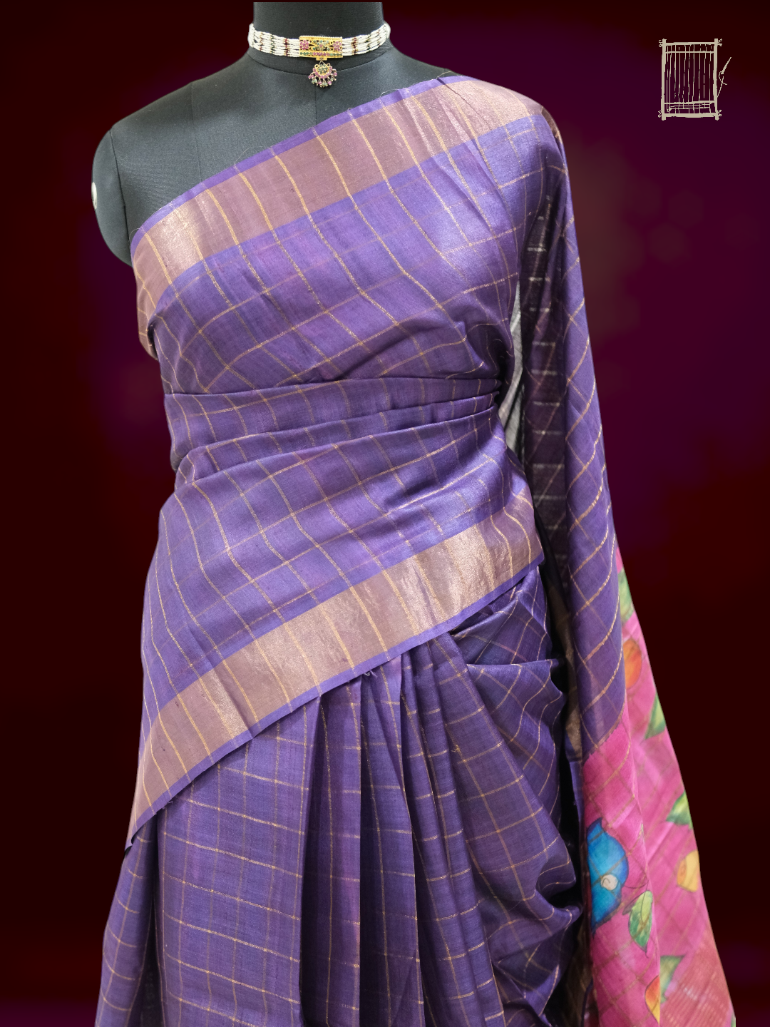 Half-body drape of dusty violet tussar saree showing gold-zari checks and pallu detail