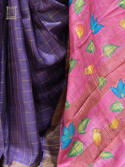 Pleats and pallu — dusty violet pleats falling beside magenta kalamkari with blue lotus